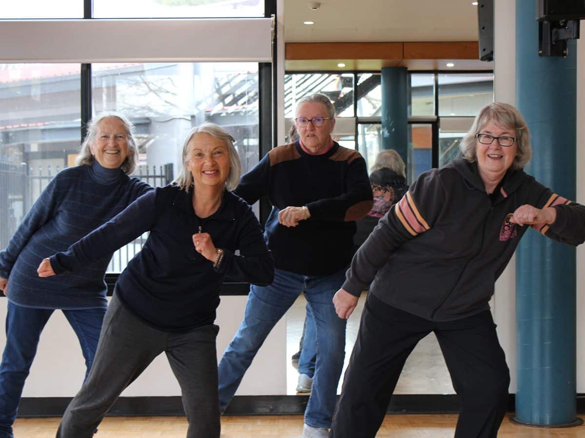 Four older women show off the hip hop moves they have learnt